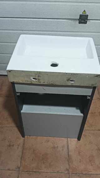 Lavabo con mueble y grifo