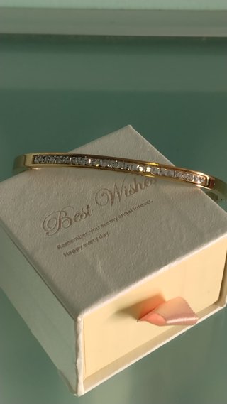 Bracciale e orecchini con strass dorati
