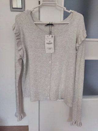 Chaqueta Zara gris talla L con volantes