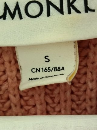 Maglione rosa collo alto cropped