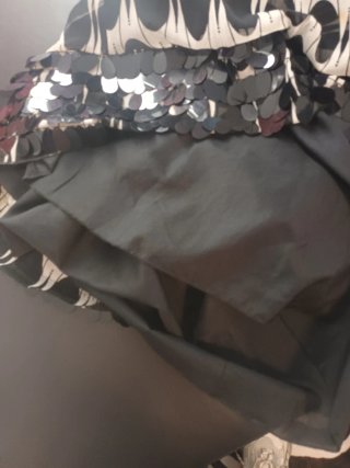Vestido sin mangas con lazada y lentejuelas