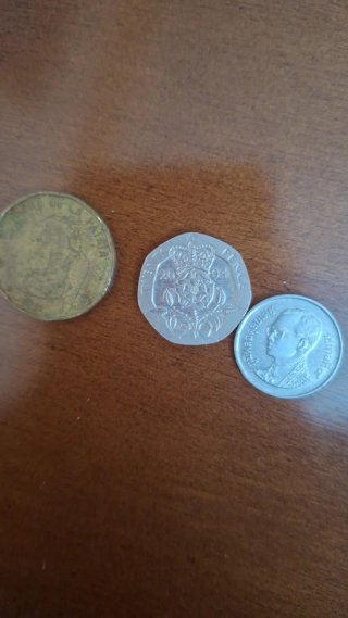 Moneda 25 Cts con agujero