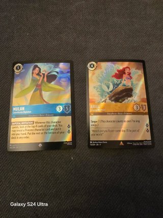 Lorcana Mulan y Ariel FOIL