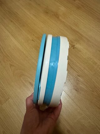 Orinal portátil infantil azul con corona