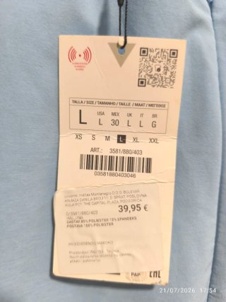 Abito lungo celeste con fiore