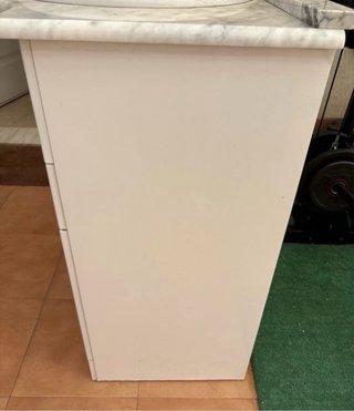 Mueble de baño con lavabo de mármol