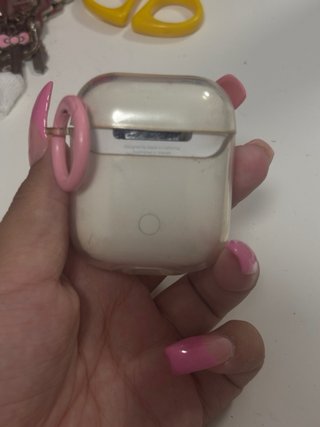 AirPods 1ª Gen con funda rosa