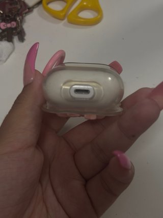 AirPods 1ª Gen con funda rosa
