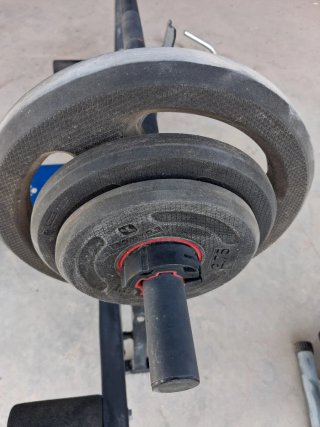 Barra de musculación con discos