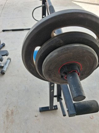 Barra de musculación con discos