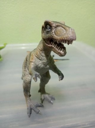 Figuras de dinosaurios y pterodáctilo
