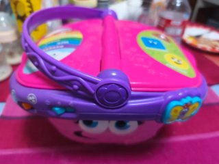 Juguete infantil musical rosa y morado