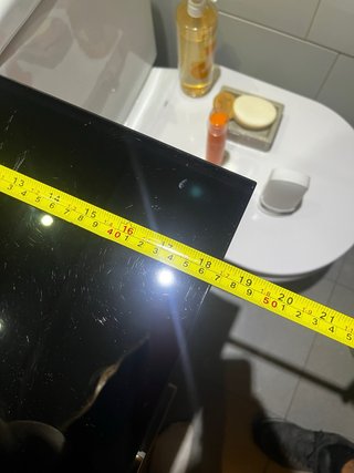 Lavabo de cerámica negro con mueble