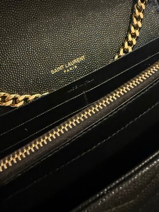 Saint Laurent Pochette con cartellino