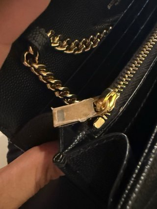 Saint Laurent Pochette con cartellino