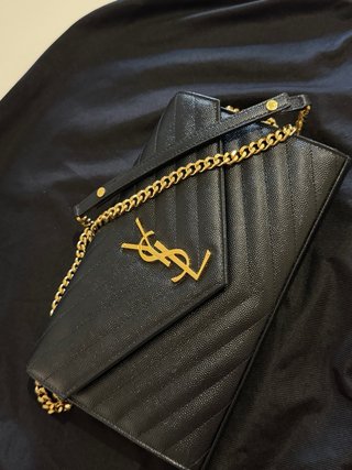 Saint Laurent Pochette con cartellino