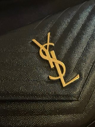 Saint Laurent Pochette con cartellino