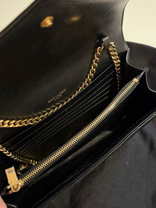 Saint Laurent Pochette con cartellino