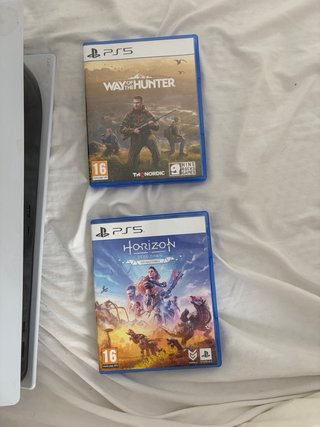 Playstation 5 con 2 juegos y 1 mando