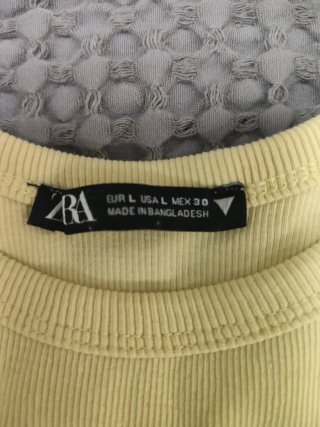 Camiseta Zara sin mangas amarilla Talla L