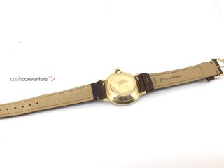 reloj de oro oro 18k con piedra