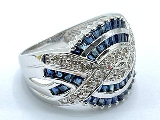 anillo oro 18k con piedra con diamante,zafiro