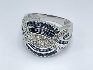 anillo oro 18k con piedra con diamante,zafiro