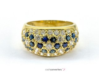anillo oro 18k con piedra con zafiro,circonita