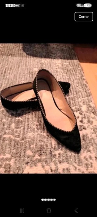 Zapatos planos negros con detalle