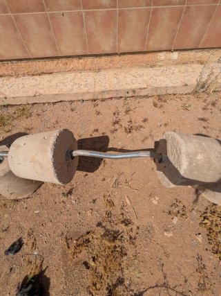 Barra de pesas olímpica de gimnasio