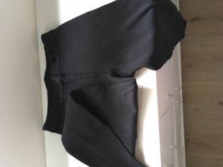 Casco y pantalón montar a caballo