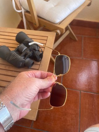 Gafas de sol Ray-Ban doradas y marrones