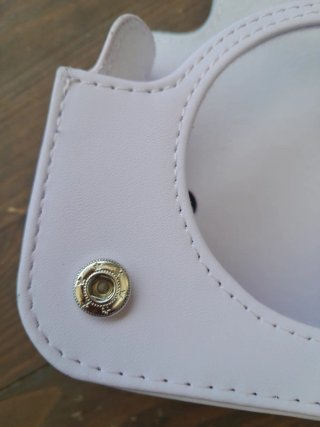 Custodia con tracolla per mini fotocamera