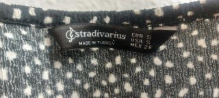 Mono negro estampado lunares Stradivarius