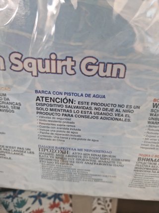 Lancha con juego peonzas y pistola agua
