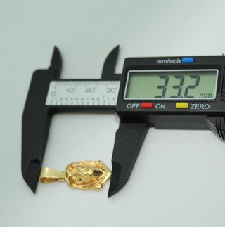 Colgante de oro de 18k. Peso: 4.92 gr.