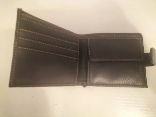 Billetera negra con monedero y tarjetero