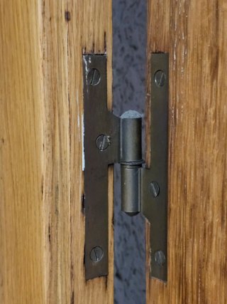 Últimos días: Puerta de madera con cristal