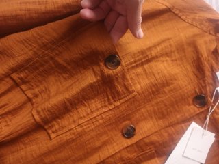 Chaqueta Zara naranja con cinturón