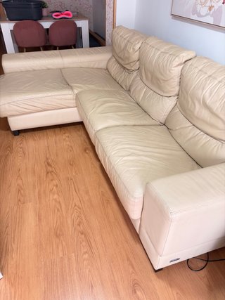Divano angolare beige in pelle