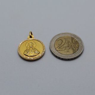 Colgante de oro de 18k. Peso: 4.26 gr.