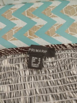Top corto estampado cebra Primark talla M