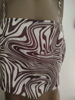 Top corto estampado cebra Primark talla M