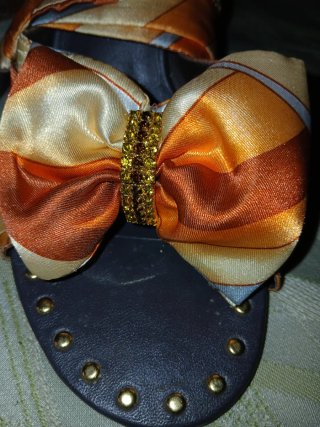 Sandalias Roberto Cavalli doradas y naranjas