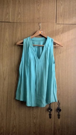 Blusa verde sin mangas talla S