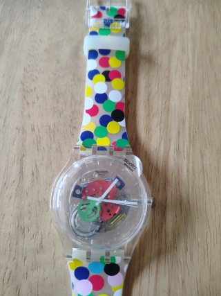 Orologio Swatch con scatola e cinturino a pois