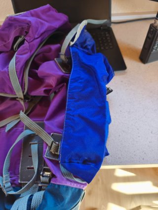 Mochila lila grande con bolsillos