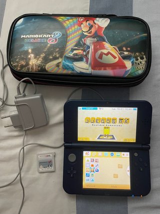 Nintendo 3DS XL + Mario Kart 7 + Accessori