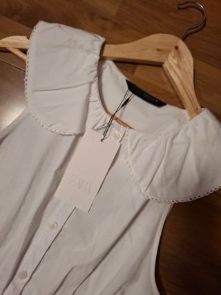 Blusa Zara blanca con volantes