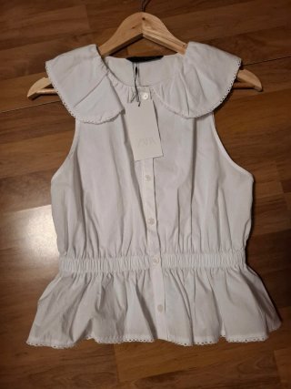 Blusa Zara blanca con volantes